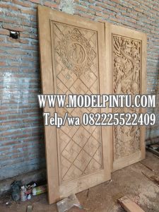 Model Pintu Masjid Jati Minimalis Ukiran Kaligrafi